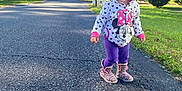 Layla joined the competition — help win amazing prizes! asphalt, autumn, blue_sky, child, grass, hoodie, house, leopard_boots, minnie_mouse, outdoor, person, purple_pants, residential_area, sidewalk, smiling, street, sunlight, toddler, trees, walking