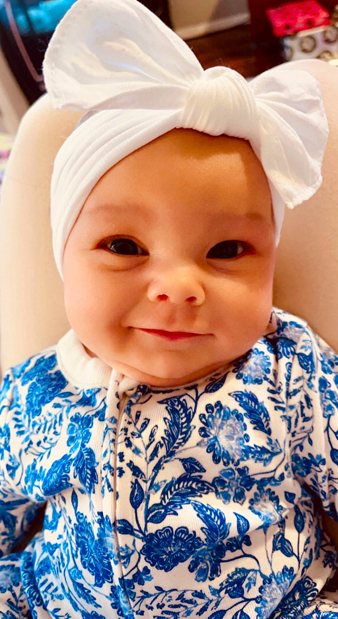 Zelda is registered to the contest to win money with this photo: baby_toddler_clothing, cheek, chin, clothing, dress, eye, eyebrow, eyelash, face, hair, happy, headwear, human_body, iris, lip, nose, outerwear, person, skin, sleeve