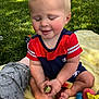 Noel joined the competition — help win amazing prizes! baby, child, grass, outdoor, watermelon, blanket, toy, footwear, happy, smiling, sitting, person, clothing, hand, leg, face, nature, summer, play, relaxation
