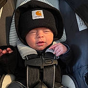 Kingsley joined the competition — help win amazing prizes! adorable, baby, black_beanie, car_seat, carhartt, child, closed_eyes, cozy, cute, indoor, infant, newborn, peaceful, portrait, safety, sitting, small_hands, straps, warm, winter_clothing