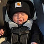 Kingsley joined the competition — help win amazing prizes! baby, beanie, black_clothing, car_seat, child, closed_eyes, cozy, cute, hand, headwear, infant, jacket, newborn, portrait, safety_harness, seatbelt, sleeping, smile, winter_clothing, young