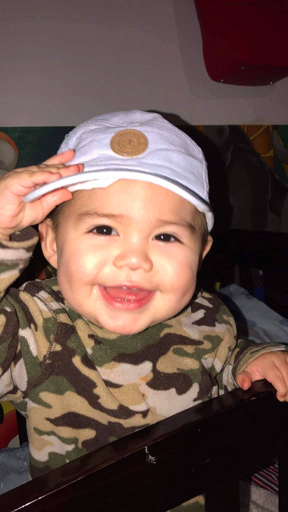 Manny joined the competition — help win amazing prizes! baby, cap, cheek, child, headgear, headwear, joy, person, smile, toddler