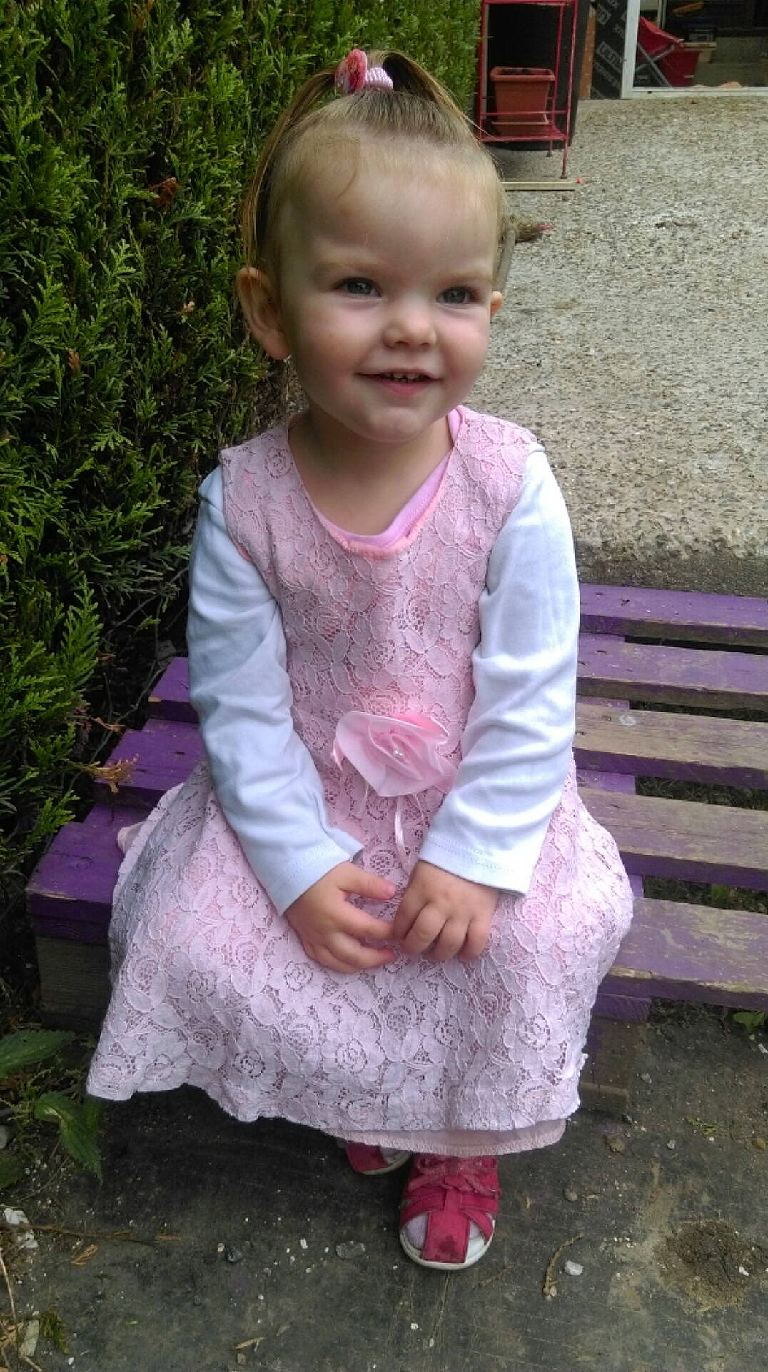 Emma participe au concours pour gagner de l'argent avec cette photo : child, day, dress, fun, girl, infant, joy, outerwear, person, pink, play, sitting, skin, smile, textile, toddler