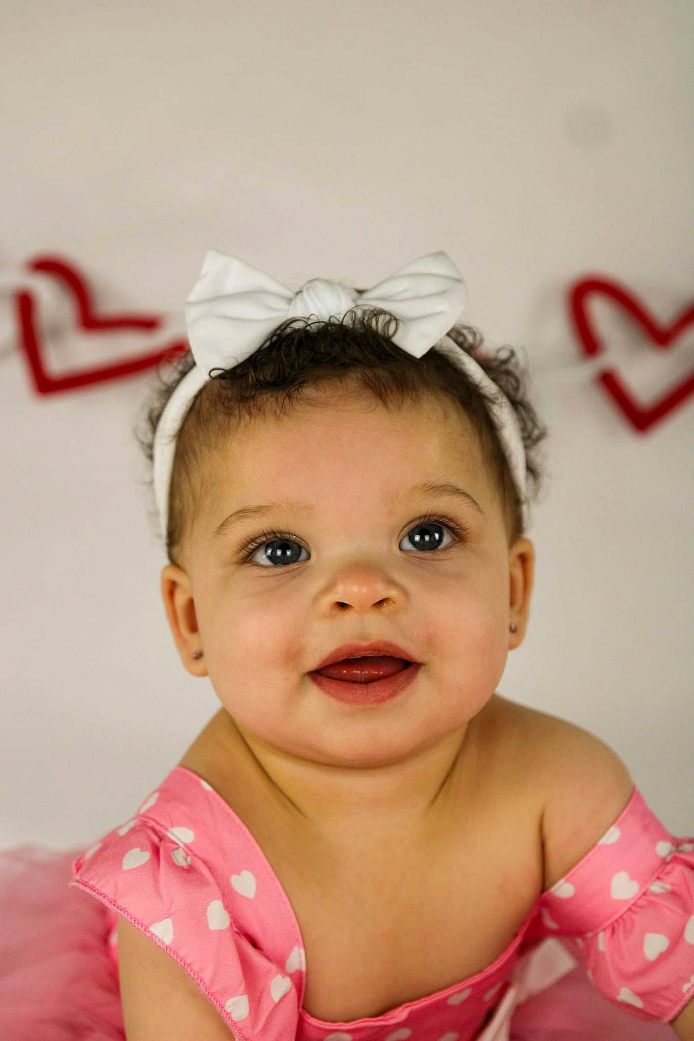 Avani joined the competition — help win amazing prizes! baby_toddler_clothing, cheek, dress, embellishment, eyebrow, eyelash, face, flash_photography, hair_accessory, happy, headband, headgear, headpiece, iris, jewellery, lip, lipstick, person, pink, smile