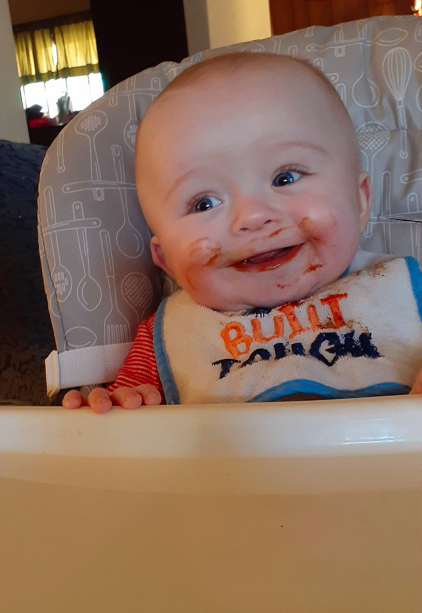 Kristopher is registered to the contest to win money with this photo: baby, baby_laughing, baby_products, baby_safety, baby_toddler_clothing, bathing, bib, cheek, child, curtain, eyebrow, finger, fun, happy, iris, joy, mouth, person, sitting, skin
