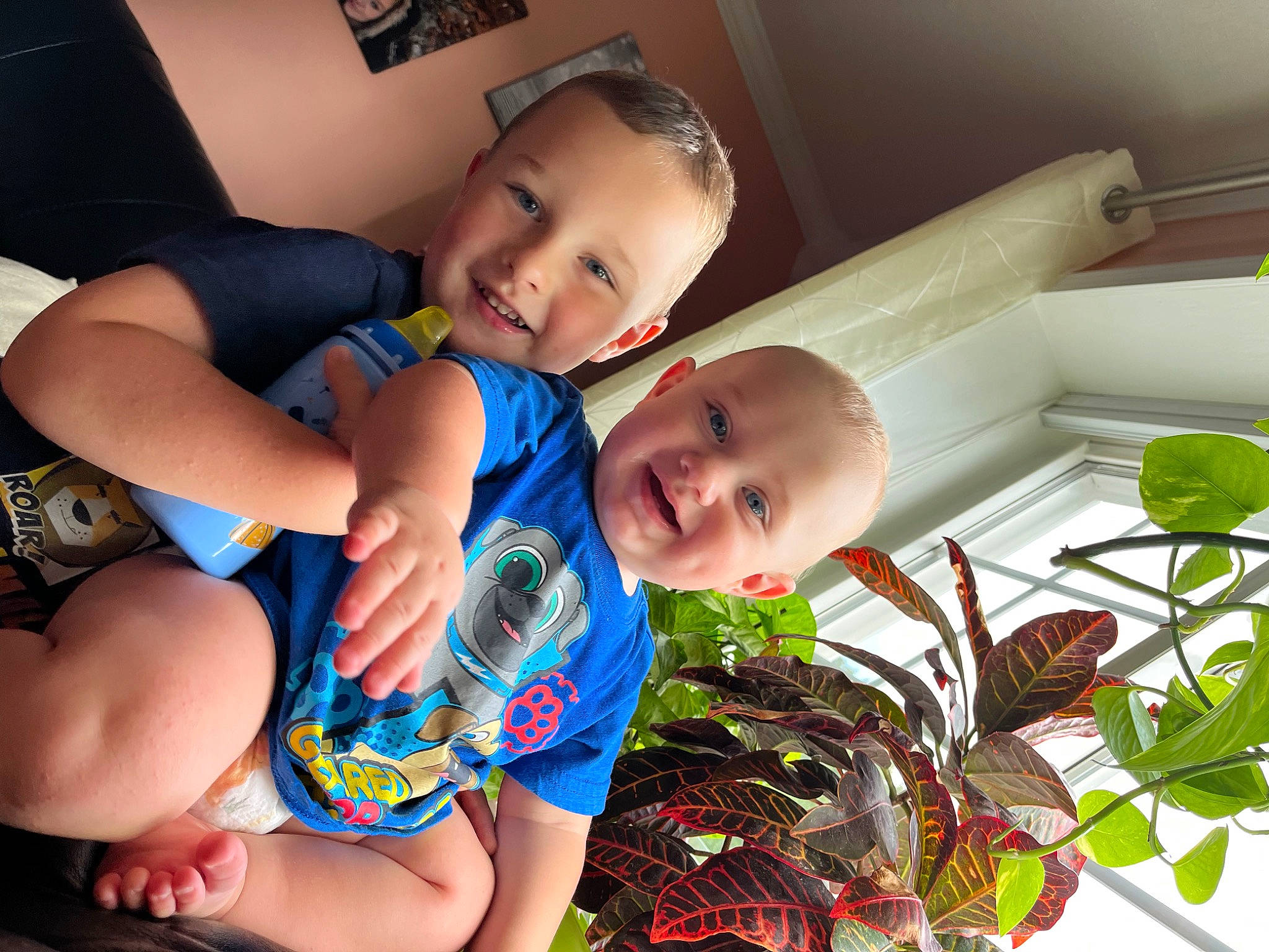 Miko?aj is registered to the contest to win money with this photo: abdomen, baby, chest, child, facial_expression, fun, happy, head, human_leg, joy, leisure, mouth, people_in_nature, person, plant, product, skin, smile, thigh, thumb