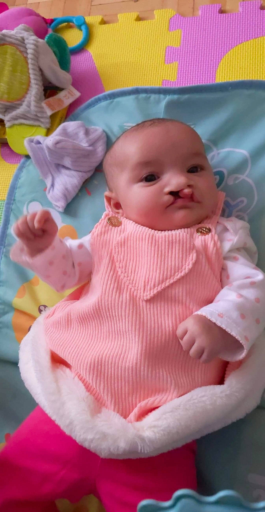 Mia participe au concours pour gagner de l'argent avec cette photo : baby, baby_products, baby_toddler_clothing, baby_toys, cheek, child, craft, fur, linens, peach, person, pink, textile