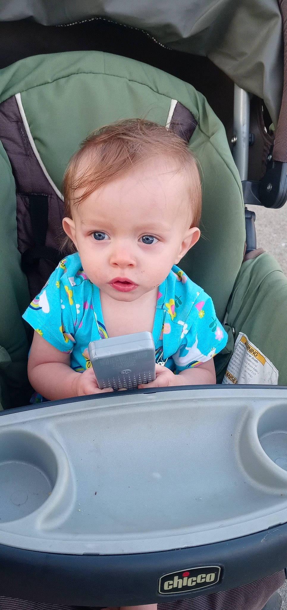 Hazel is registered to the contest to win money with this photo: auto_part, baby, baby_toddler_clothing, car_seat, cheek, child, chin, comfort, dress, facial_expression, finger, fun, hairstyle, mouth, person, photograph, product, seat_belt, skin, toddler