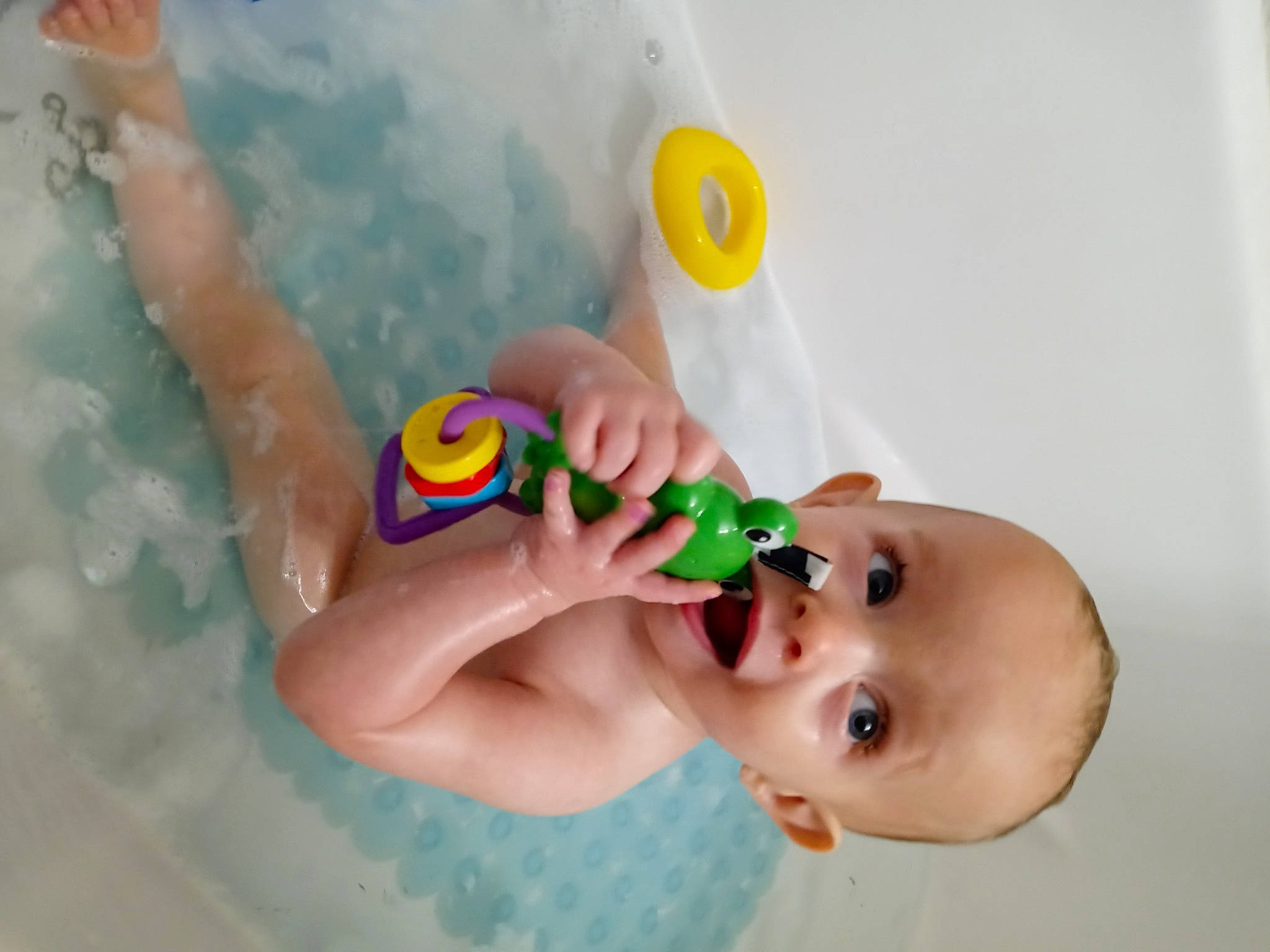 Hazel is registered to the contest to win money with this photo: baby, baby_playing_with_toys, baby_products, bath_toy, bathing, chest, child, finger, fun, happy, leisure, liquid_bubble, nail, person, play, product, recreation, surprise, swimming_pool, toddler