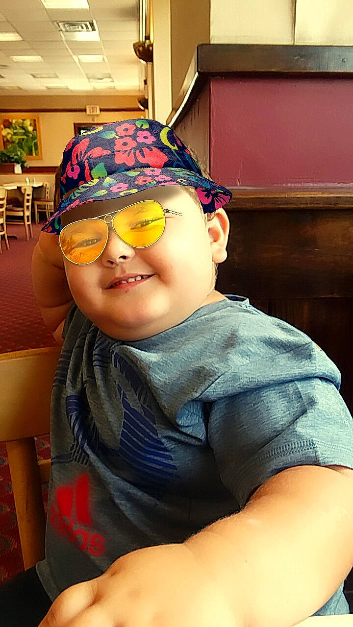 Scott is registered to the contest to win money with this photo: child, cool, eyewear, fun, glasses, headgear, headwear, joy, person, vision_care