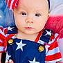 baby, child, face, headband, bow, blue_eyes, clothing, stars, stripes, red, white, blue, hand, nails, overalls, portrait, cute, infant, pattern, fabric