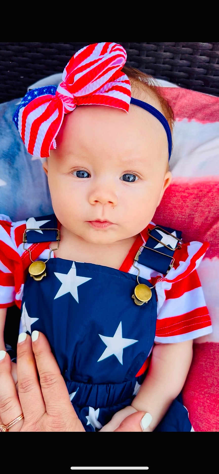 Remi joined the competition — help win amazing prizes! baby, child, face, headband, bow, blue_eyes, clothing, stars, stripes, red, white, blue, hand, nails, overalls, portrait, cute, infant, pattern, fabric