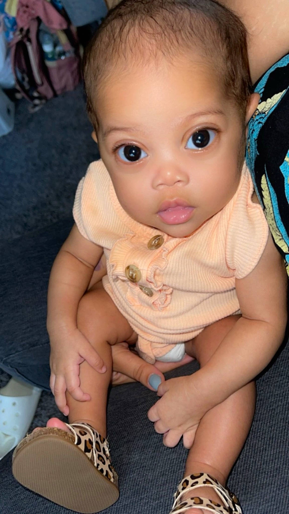 Calliopé is registered to the contest to win money with this photo: baby, baby_toddler_clothing, cheek, chest, child, chin, eye, eyelash, finger, fun, gesture, hair, happy, iris, lip, mouth, nose, person, skin, toddler