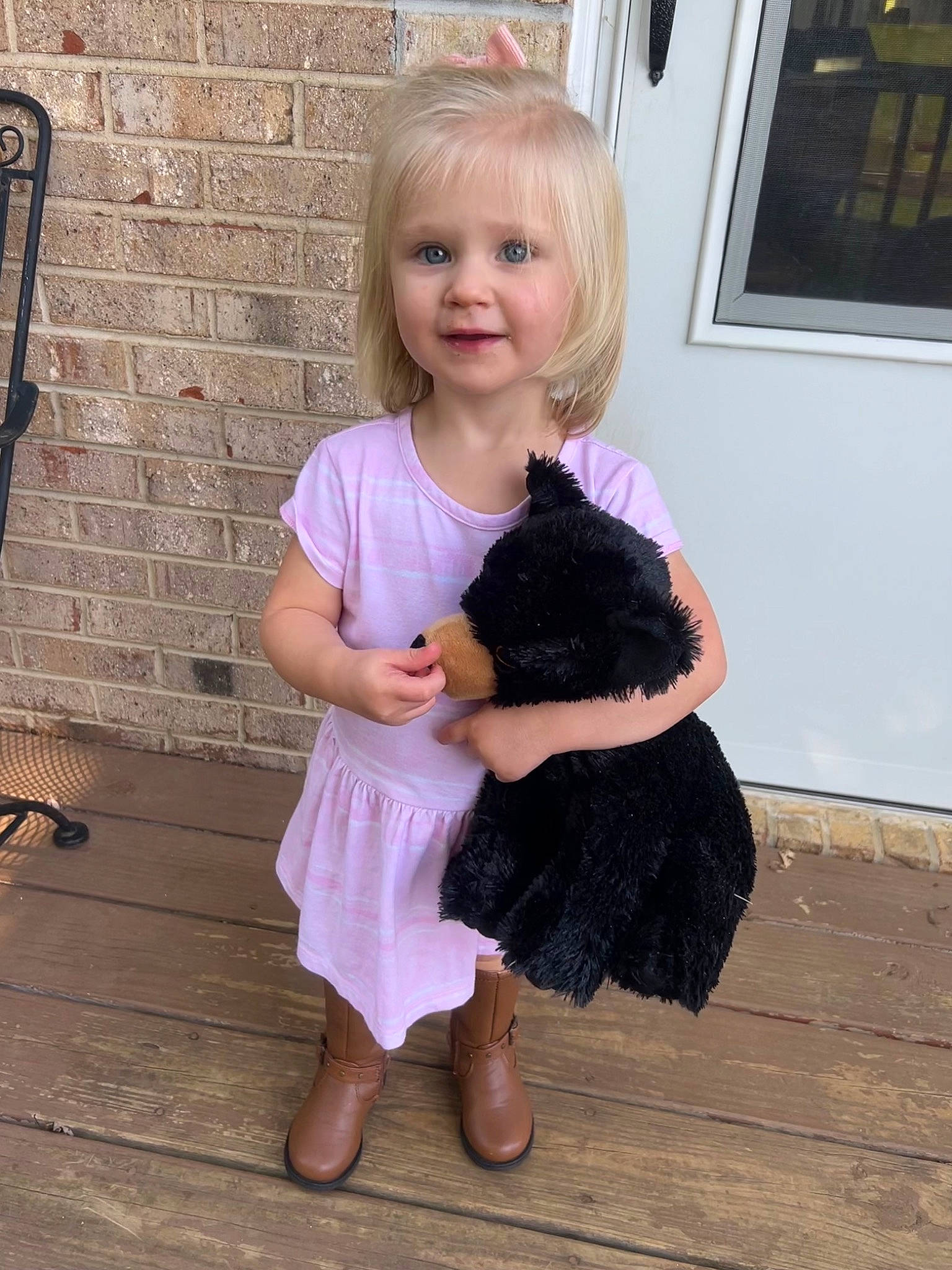 Jamie is registered to the contest to win money with this photo: baby_toddler_clothing, clothing, day_dress, dress, face, fawn, foot, fun, happy, joy, leg, magenta, person, picture_frame, purple, sleeve, smile, standing, thumb, toddler