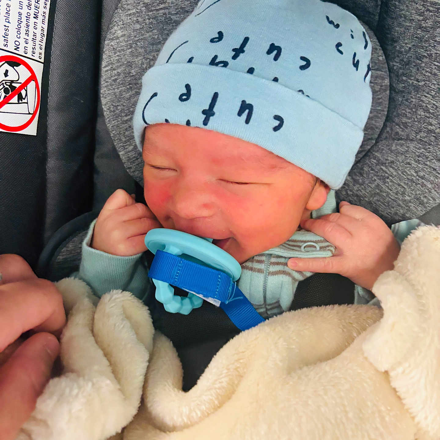 Nyseem Harrell joined the competition — help win amazing prizes! baby, blanket, bodypart, bonnet, cap, car, clothing, face, finger, furniture, glove, hand, hat, head, newborn, person, photography, portrait, sleeping, transportation
