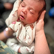 Sebastian joined the competition — help win amazing prizes! baby, child, closeup, cozy, cute, face, hand, human, infant, newborn, onesie, peaceful, person, portrait, resting, skin, sleeping, soft_lighting, tiny, warm