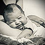 arm, baby, black_and_white, blanket, closeup, comfort, cozy, cute, family, hand, infant, newborn, person, portrait, resting, skin, sleepy, smile, soft, toddler