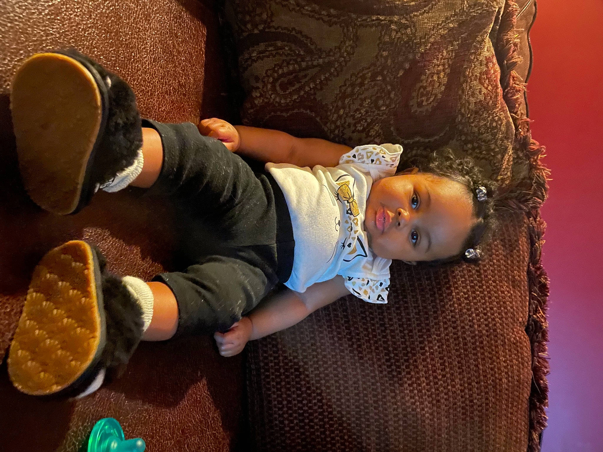 Milan is registered to the contest to win money with this photo: baby, baby_products, baby_toddler_clothing, baby_toys, couch, flip_flops, human, person, sandal, slipper, toddler