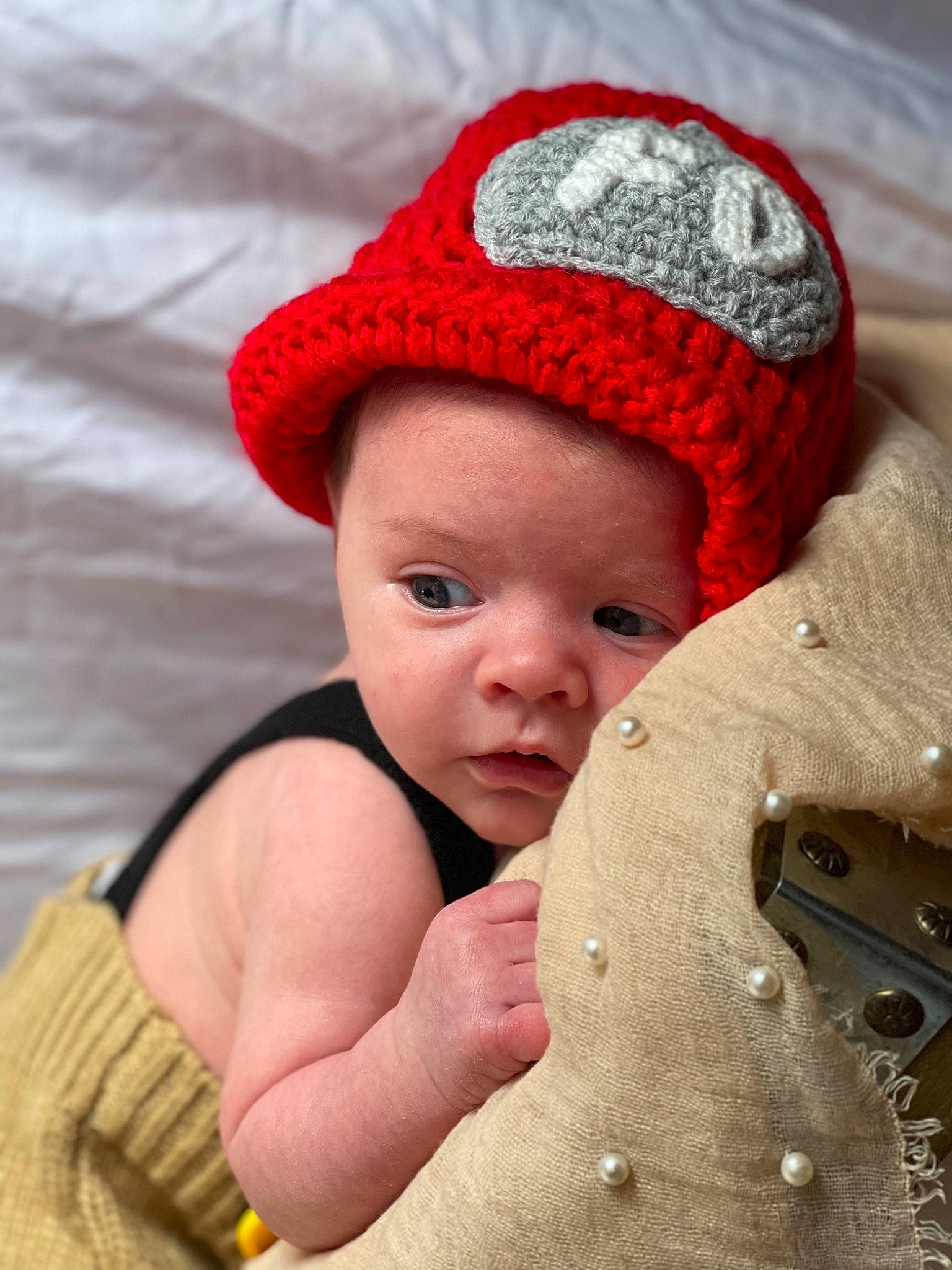 Jase joined the competition — help win amazing prizes! baby, baby_toddler_clothing, cap, cheek, child, chin, close_up, comfort, face, fashion_accessory, headgear, knit_cap, linens, lip, outerwear, person, pink, red, skin, sleeve