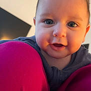 Alexander joined the competition — help win amazing prizes! baby, child, face, smile, close_up, blue_eyes, infant, cute, happy, indoor, portrait, warm_lighting, soft_focus, magenta, fabric, clothing, person, young, head, cheeks