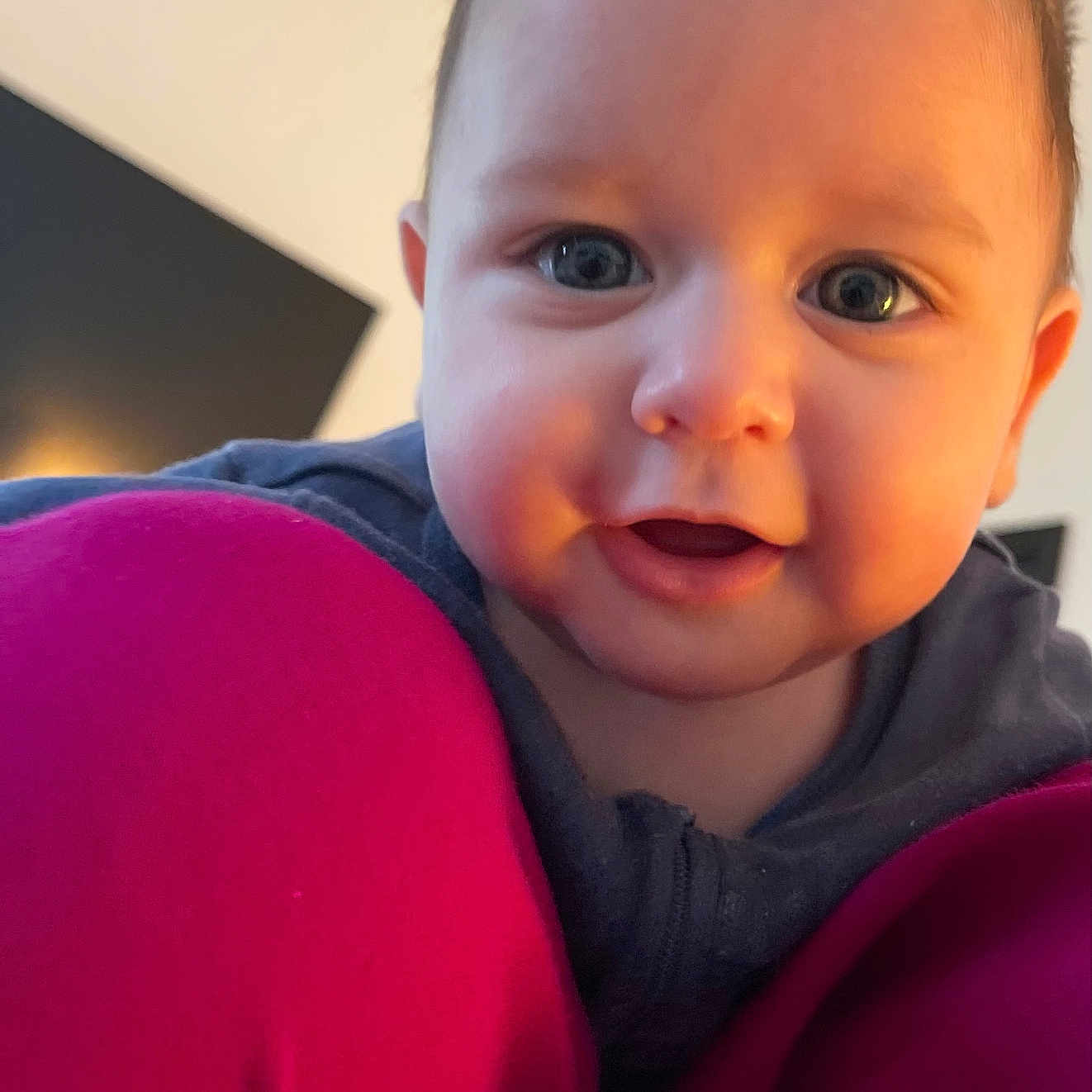 Alexander joined the competition — help win amazing prizes! baby, blue_eyes, cheeks, child, close_up, clothing, cute, fabric, face, happy, head, indoor, infant, magenta, person, portrait, smile, soft_focus, warm_lighting, young