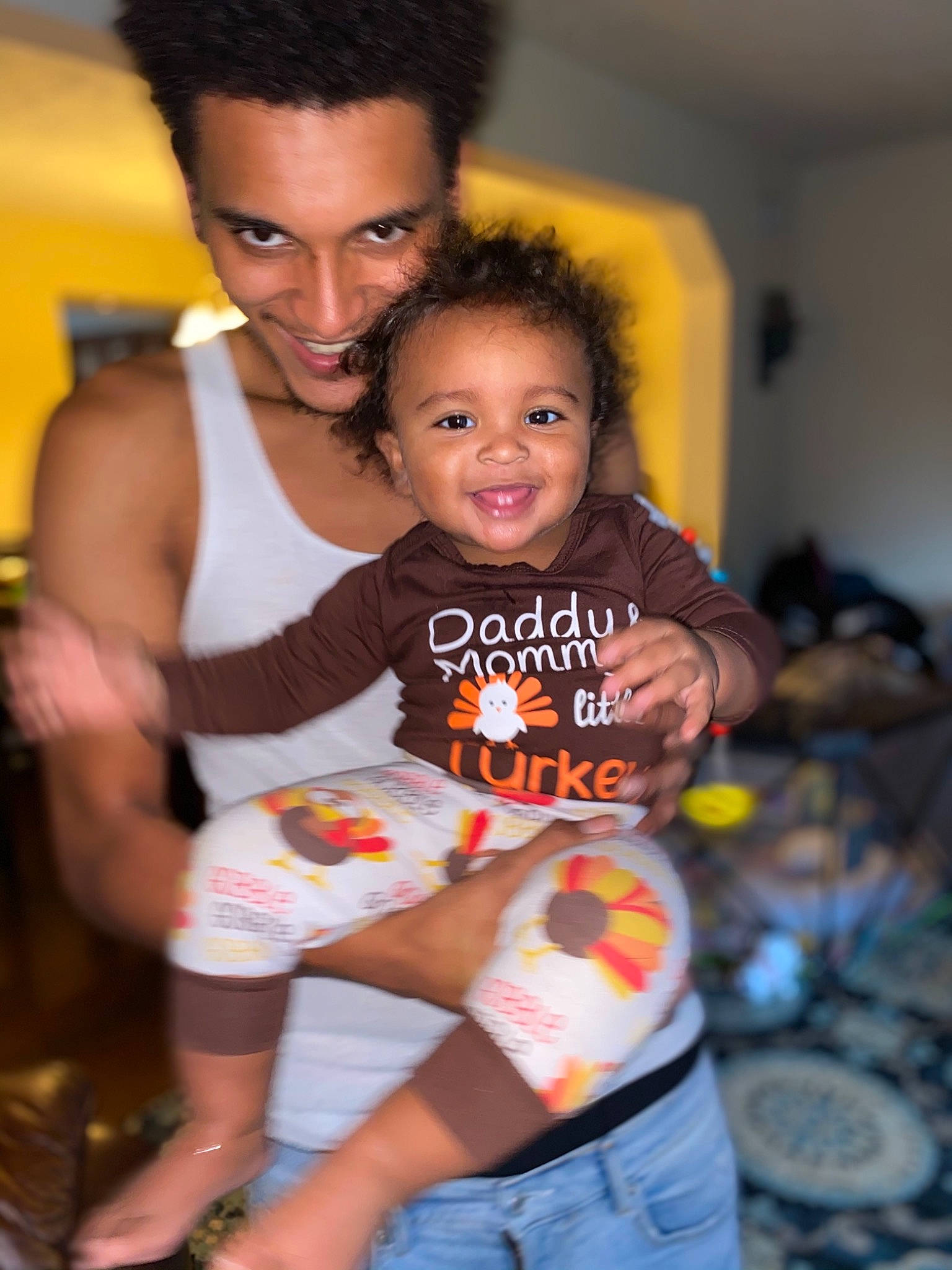 Benji is registered to the contest to win money with this photo: abdomen, active_tank, afro, arm, baby_toddler_clothing, black_hair, caesar_cut, cool, denim, eye, finger, hairstyle, hand, human_body, jheri_curl, joy, lap, person, s_curl