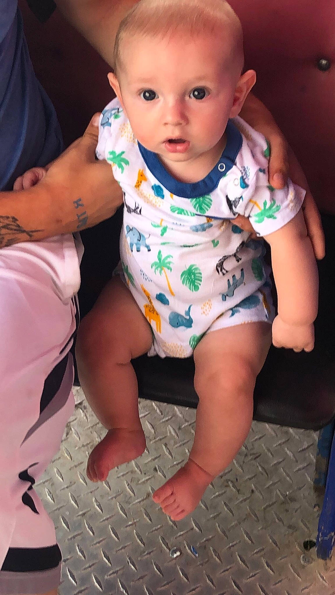 Brycen is registered to the contest to win money with this photo: arm, baby, baby_toddler_clothing, black, blue, cheek, chin, facial_expression, flash_photography, fun, happy, human_body, joint, leg, mouth, nose, person, skin, sleeve, surprise