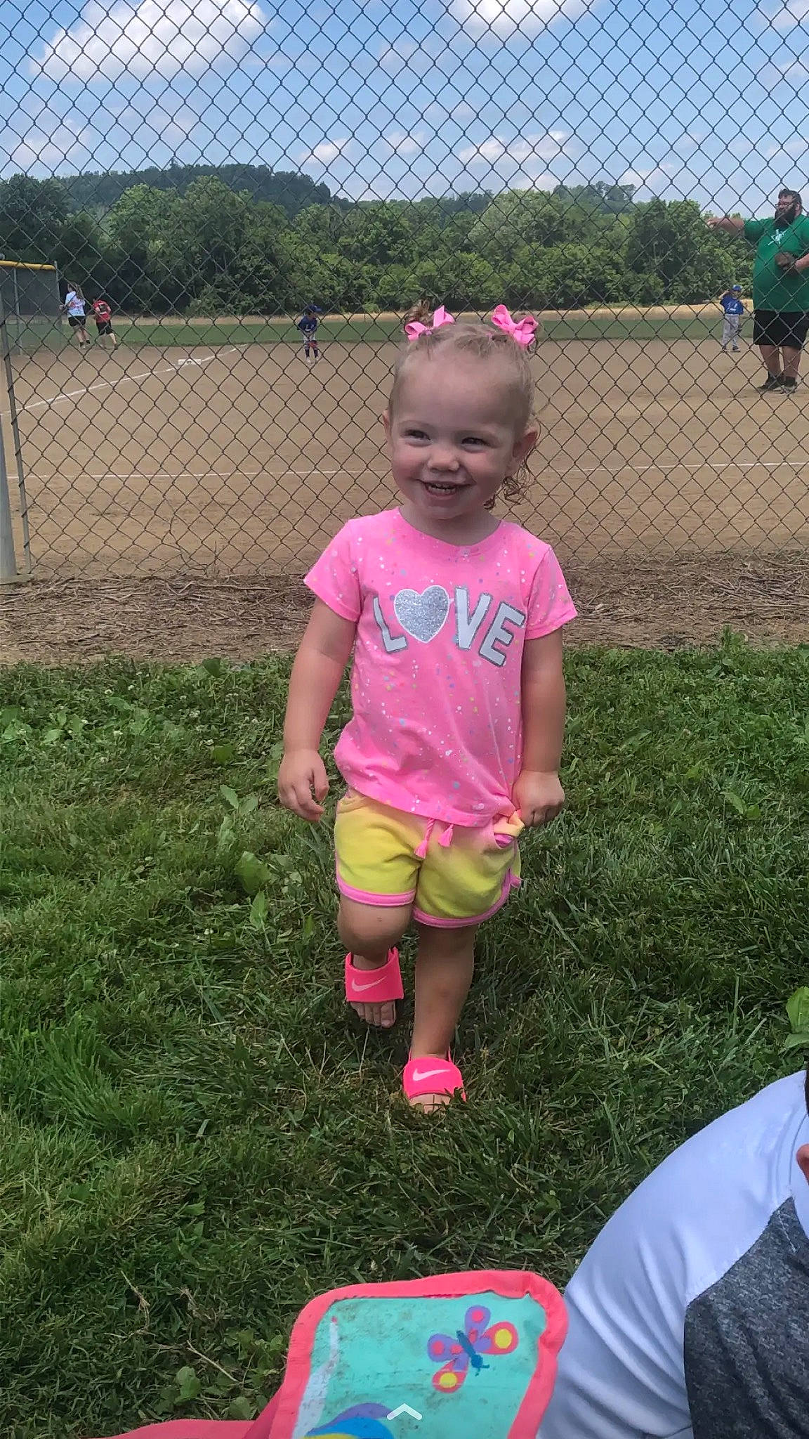 Miraya joined the competition — help win amazing prizes! child, fence, fun, grass, grassland, happy, joy, landscape, lawn, leisure, magenta, person, pink, play, recreation, shorts, sky, smile, soil, t_shirt