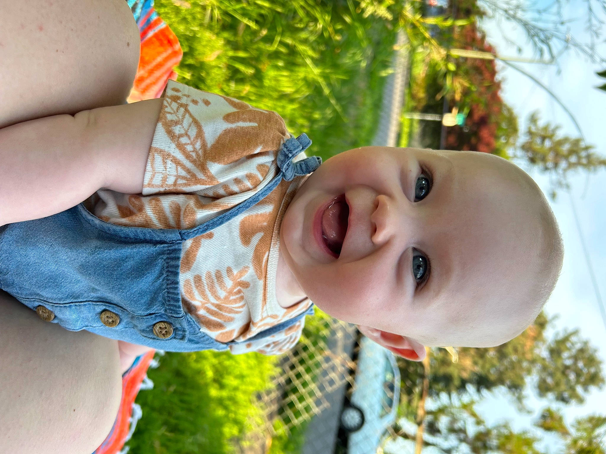 Odette joined the competition — help win amazing prizes! baby, child, face, fruit, fun, grass, hand, happy, iris, leisure, nose, people_in_nature, person, plant, recreation, skin, smile, spring, summer, toddler