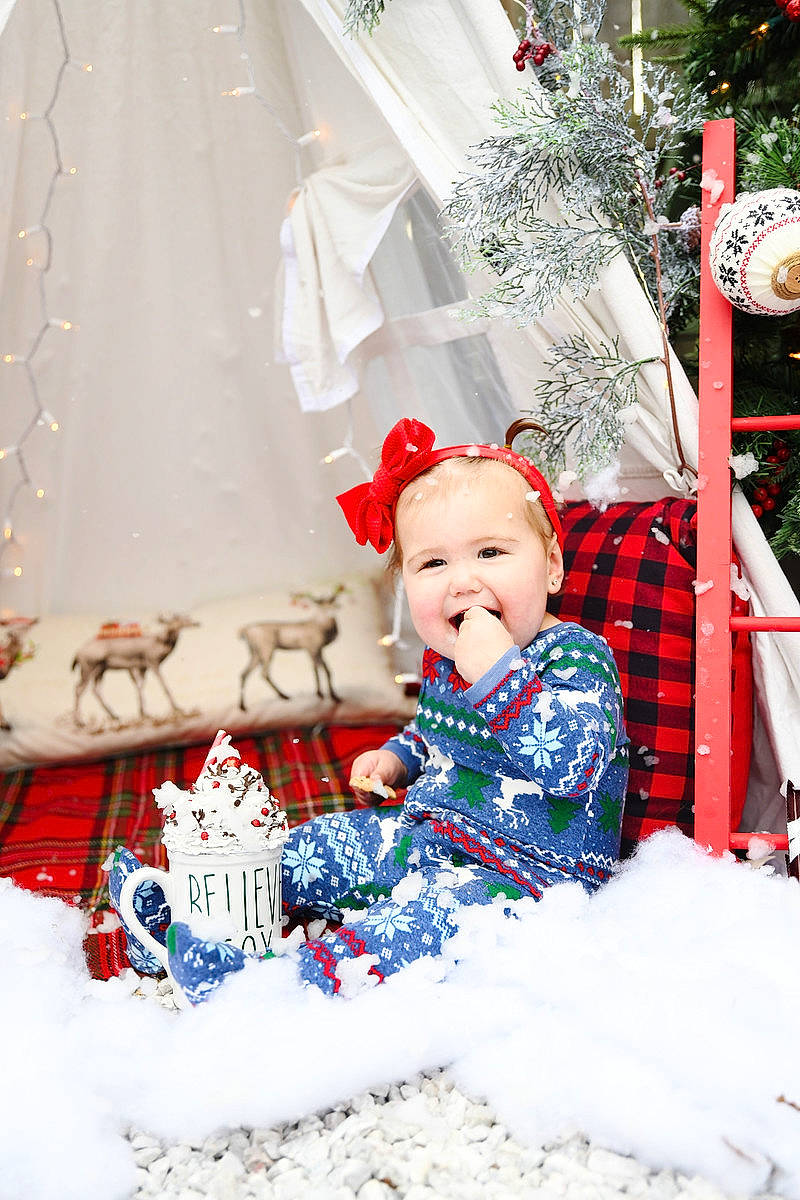 Elara joined the competition — help win amazing prizes! baby, baby_toddler_clothing, child, christmas, christmas_decoration, christmas_eve, costume_accessory, fictional_character, holiday, home_accessories, human, interior_design, nose, ornament, party_supply, person, red, snow, textile, toddler
