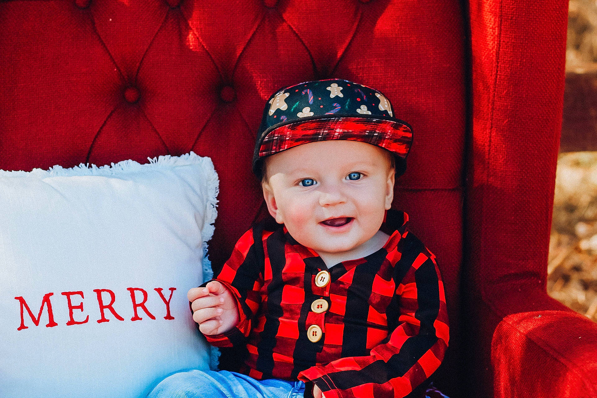 Kannon is registered to the contest to win money with this photo: baby, baby_laughing, baby_toddler_clothing, bonnet, child, costume_accessory, costume_hat, eye, headgear, headwear, mouth, nose, pattern, person, pillow, portrait_photography, red, sitting, sleeve, textile