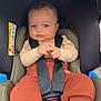Jahyann a rejoint le concours — aidez-le/la à gagner de superbes lots ! baby, car_seat, child, infant, seatbelt, blue_eyes, clothing, hands, socks, cute, sitting, safety, portrait, young_child, indoor, straps, casual_wear, closeup, expression, baby_clothes