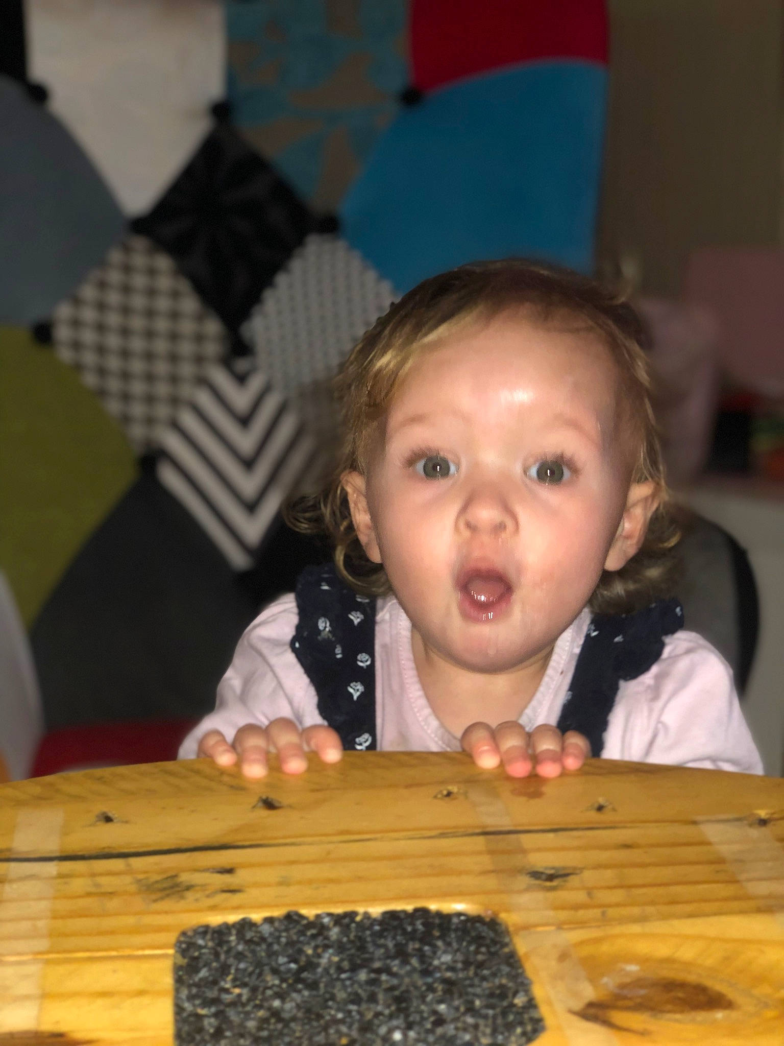 Lucie participe au concours pour gagner de l'argent avec cette photo : baby_toddler_clothing, black, chair, cheek, child, comfort_food, desk, finger, fun, happy, indoor_games_and_sports, nail, office_equipment, pattern, person, sharing, surprise, table, thumb, toddler