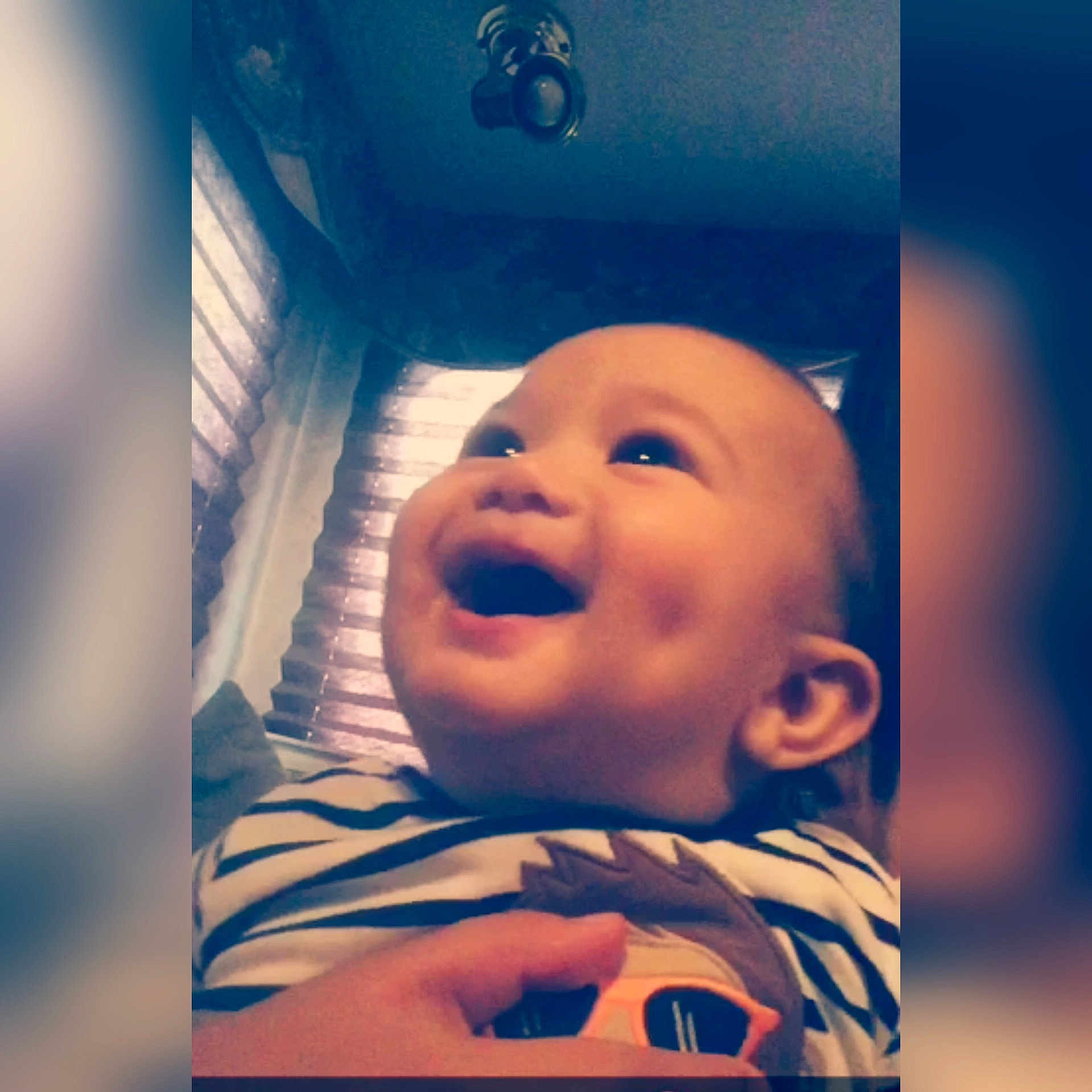 Marco is registered to the contest to win money with this photo: blue, cheek, child, chin, close_up, ear, emotion, eye, eyebrow, face, facial_expression, forehead, head, human, lip, mouth, nose, selfie, smile, toddler