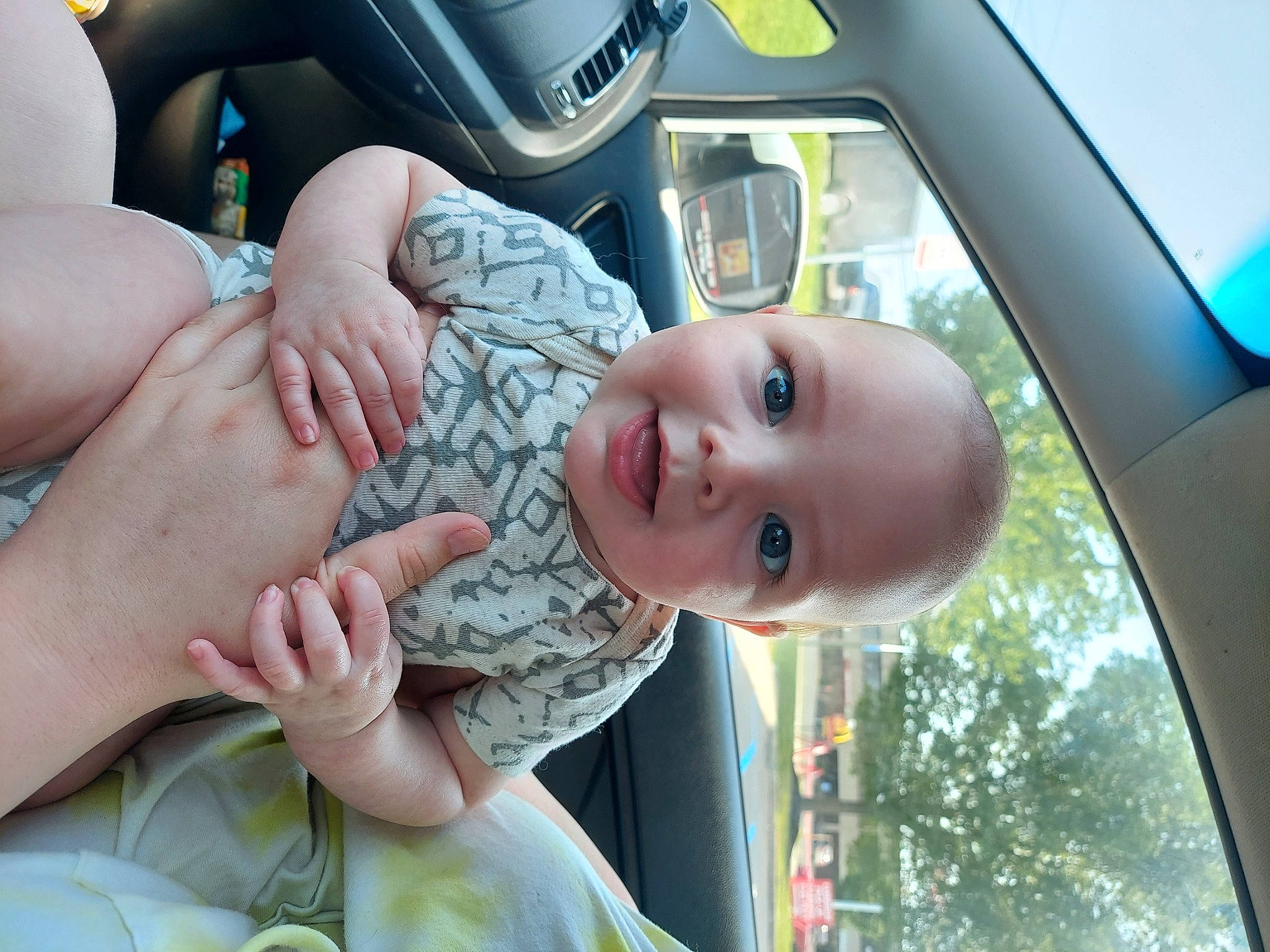 Alastor joined the competition — help win amazing prizes! automotive_exterior, automotive_lighting, automotive_mirror, baby, car, finger, gesture, hand, happy, leisure, motor_vehicle, mouth, person, skin, smile, thumb, toddler, vehicle, vehicle_door, white