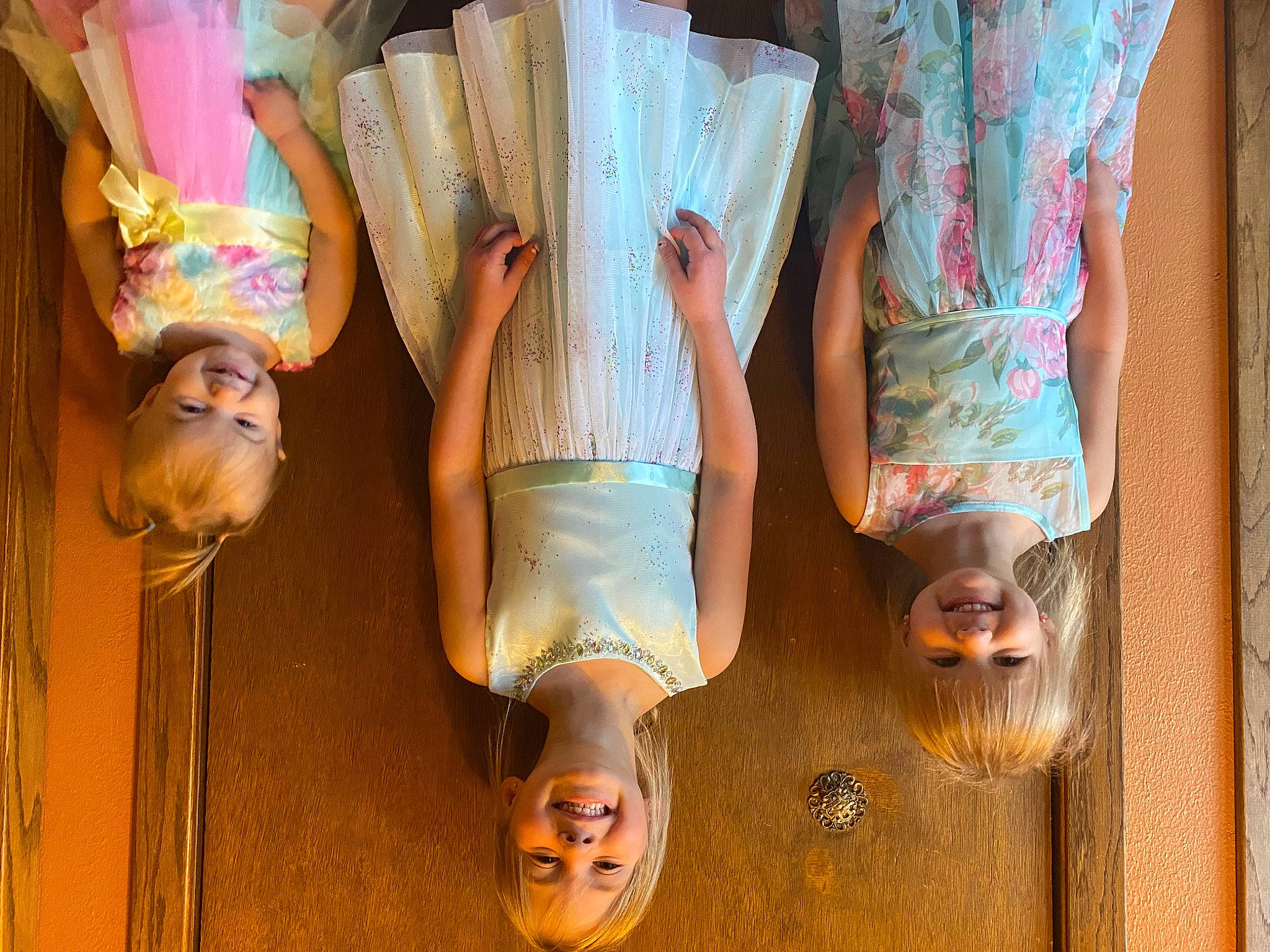 Khloey joined the competition — help win amazing prizes! barefoot, child, dress, flooring, foot, fun, happy, hardwood, human_leg, joy, leg, pattern, peach, person, room, shorts, thigh, tree, varnish, waist