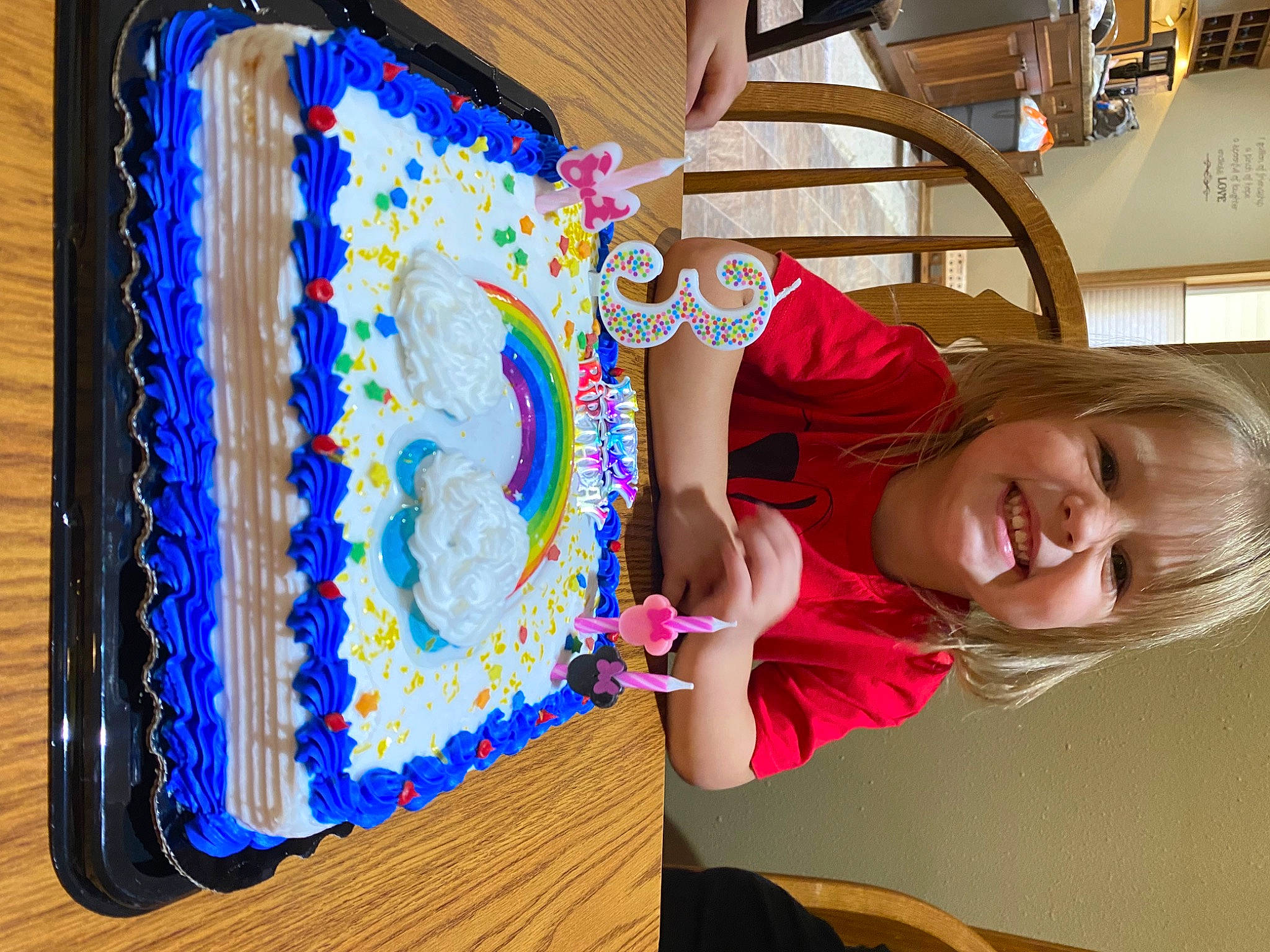 Khloey is registered to the contest to win money with this photo: art, birthday_cake, buttercream, chair, child, event, food, fun, happy, hat, icing, joy, leisure, party_supply, person, play, room, smile, sugar_cake, sweetness