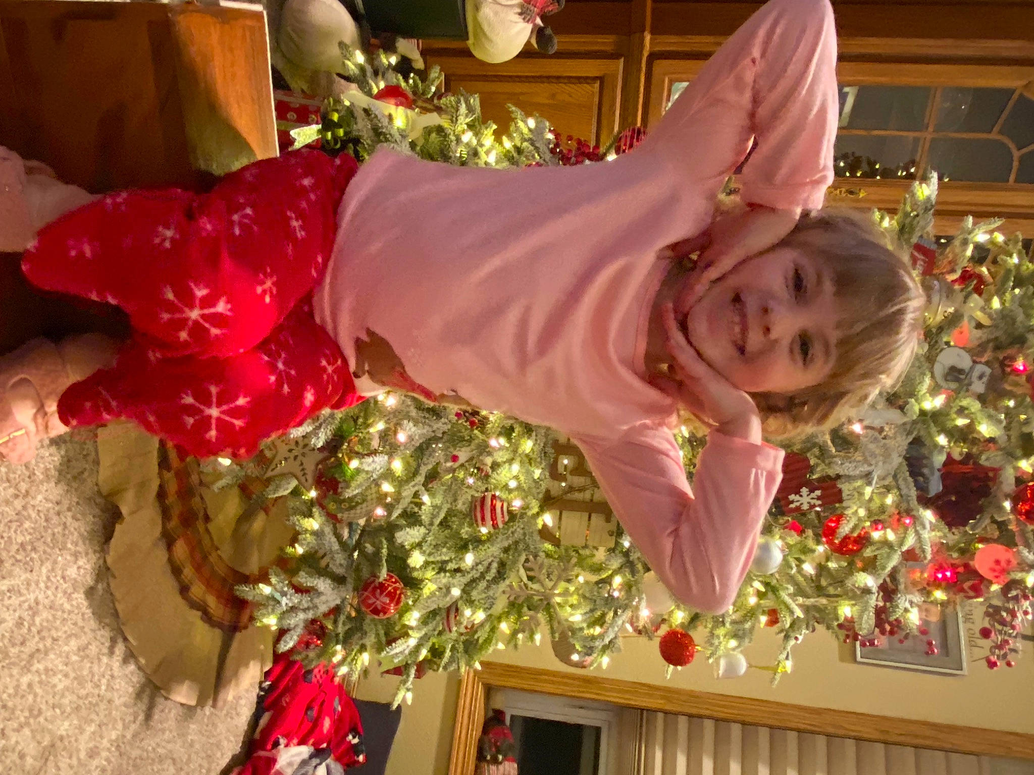 Kinzley is registered to the contest to win money with this photo: child, christmas, christmas_decoration, christmas_eve, christmas_ornament, christmas_tree, decoration, event, fun, happy, holiday, holiday_ornament, interior_design, joy, magenta, ornament, person, plant, red, smile