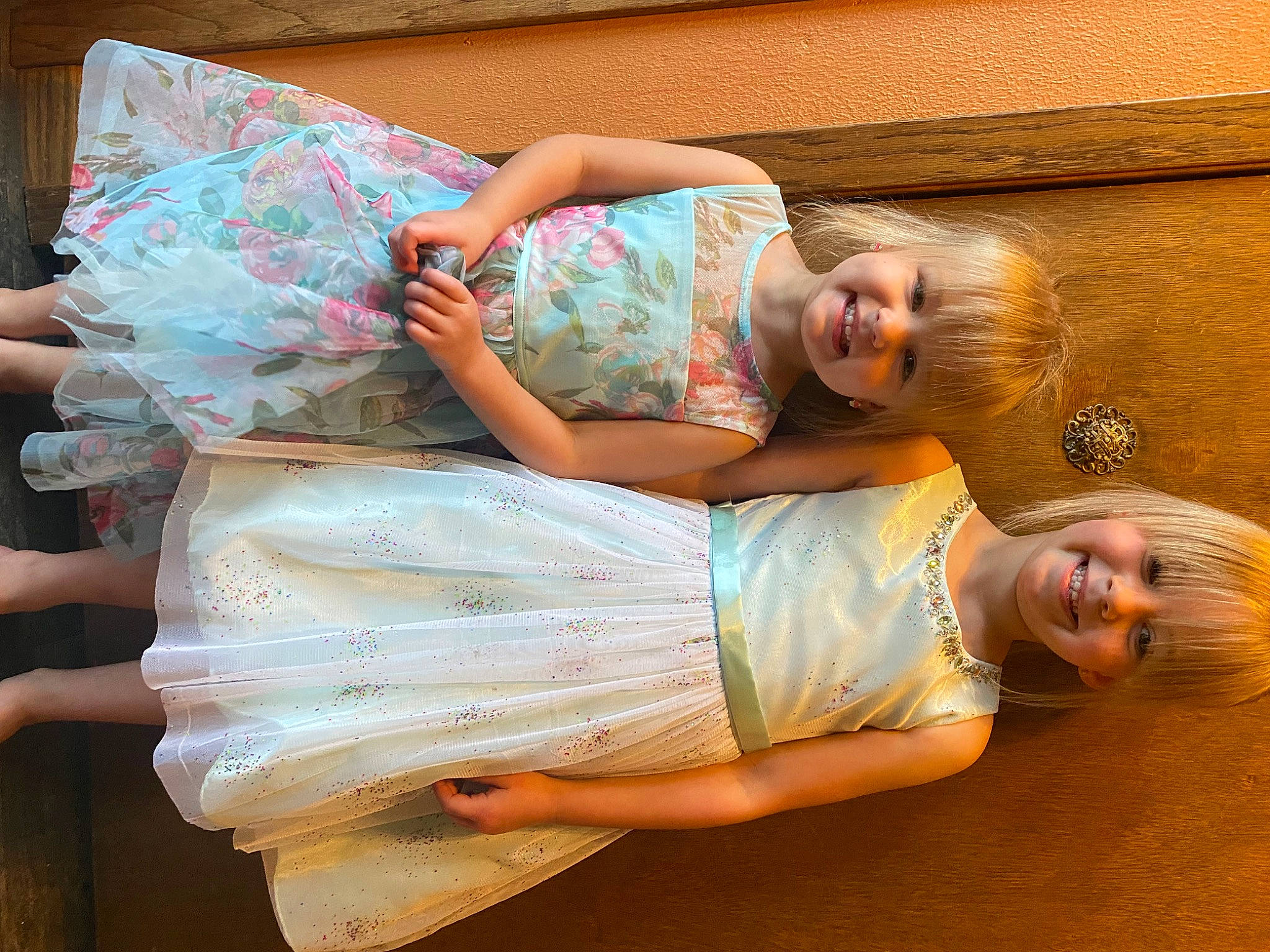 Kinzley is registered to the contest to win money with this photo: abdomen, baby_toddler_clothing, child, dress, fashion, flash_photography, fun, happy, human_leg, joint, joy, pattern, person, sitting, skin, smile, textile, thigh, toddler, trunk