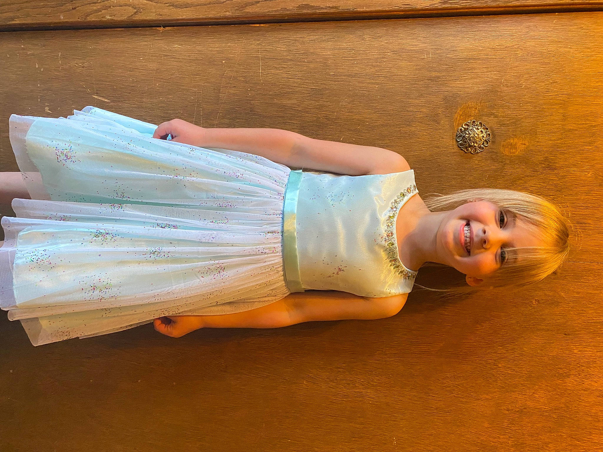 Kinzley joined the competition — help win amazing prizes! abdomen, beauty, child, comfort, elbow, flash_photography, flooring, fun, grass, happy, hardwood, human_leg, joy, knee, leisure, long_hair, person, sitting, smile, thigh