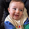 Isaac a rejoint le concours — aidez-le/la à gagner de superbes lots ! baby, child, smiling, face, portrait, sweater, colorful_clothing, person, indoor, cute, happy, infant, young_child, closeup, human, head, cheerful, playful, warm, casual