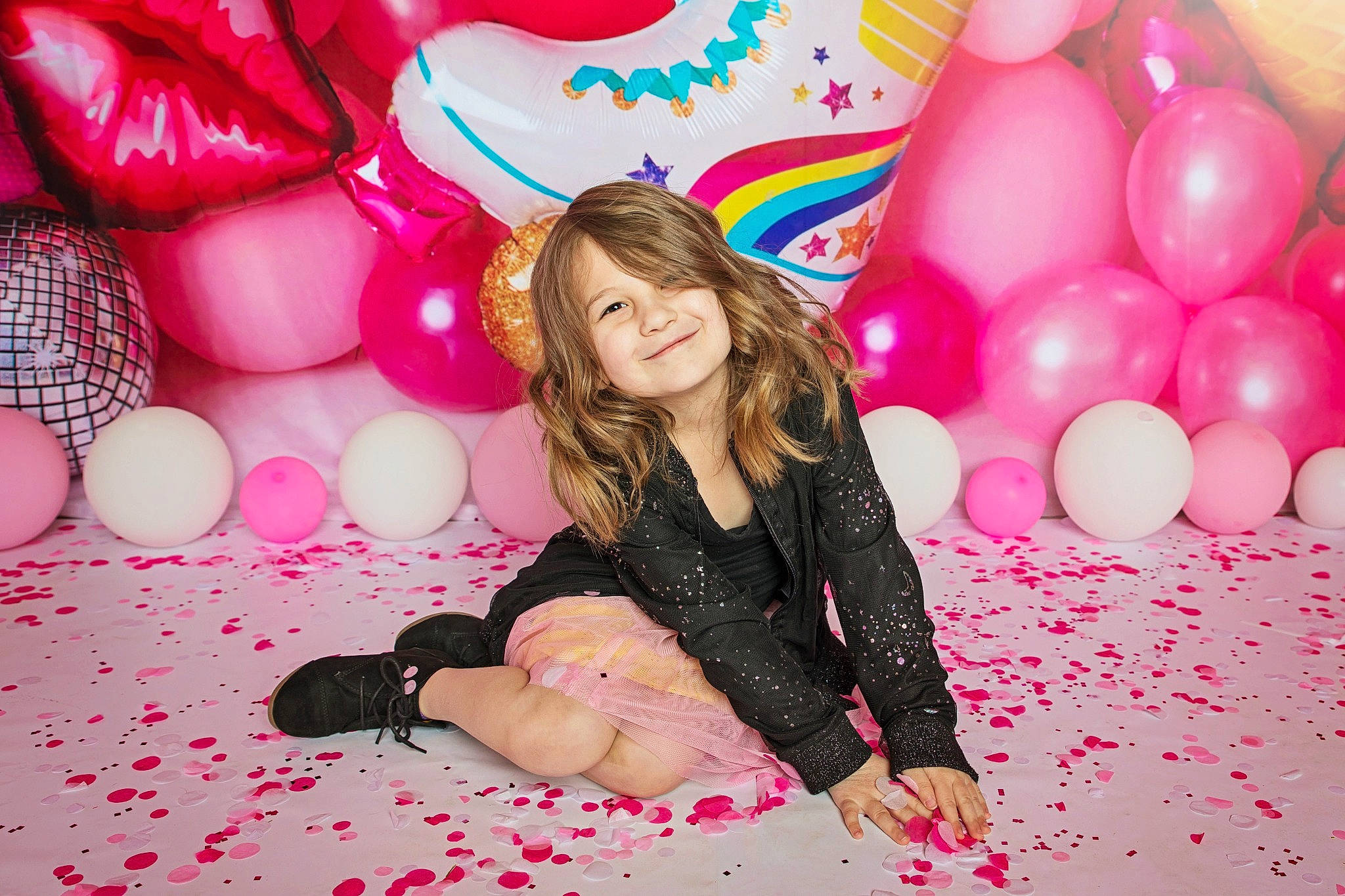 Rowan joined the competition — help win amazing prizes! balloon, child, decoration, event, flash_photography, fun, happy, human_leg, joy, leg, leisure, magenta, party, party_supply, pattern, person, pink, room, sitting, smile