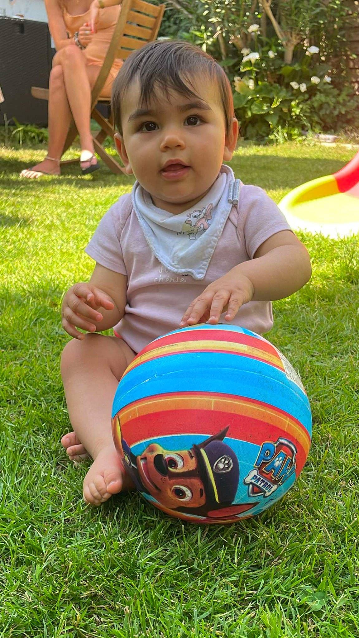 Lya participe au concours pour gagner de l'argent avec cette photo : baby_toddler_clothing, ball, child, football, fun, grass, green, happy, head, leisure, people_in_nature, person, plant, recreation, shorts, smile, soccer_ball, sports_equipment, sports_gear, toddler