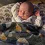 Moses joined the competition — help win amazing prizes! baby, bed, bedroom, blanket, bodypart, couch, cushion, face, furniture, head, homedecor, indoors, newborn, person, photography, portrait, quilt, room, sleeping, towel