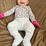 baby, babylaughing, clothing, face, footwear, happy, hat, head, hosiery, jeans, pants, person, photography, portrait, shoe, sitting, sleeve, smile, sneaker, sock