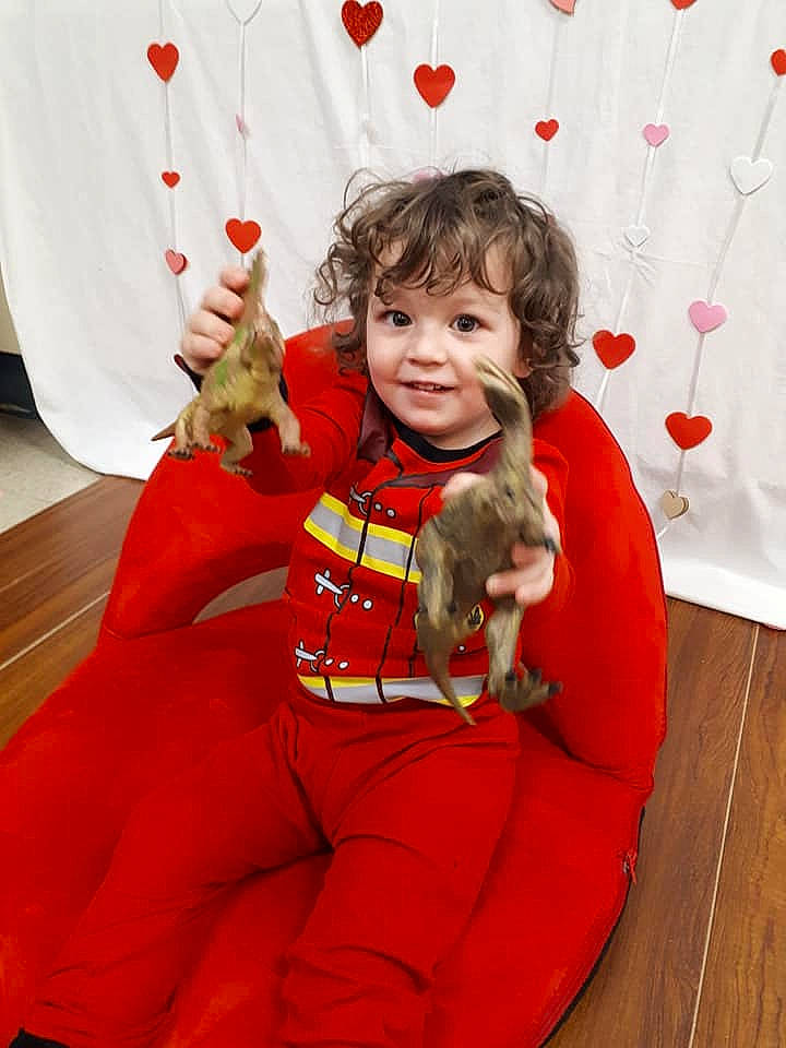 Dwayne joined the competition — help win amazing prizes! child, christmas_eve, lap, person, play, sitting, toddler