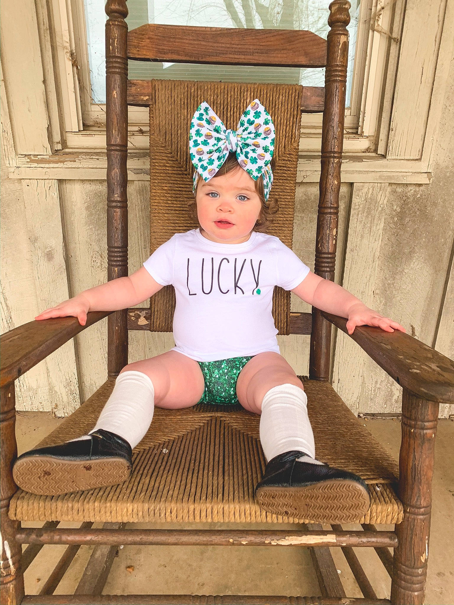 Sara-kayte is registered to the contest to win money with this photo: baby_toddler_clothing, beanie, chair, child, child_model, costume, fashion_accessory, footwear, furniture, hair_accessory, headgear, headwear, leg, neck, person, photography, shoe, sitting, sleeve, sportswear