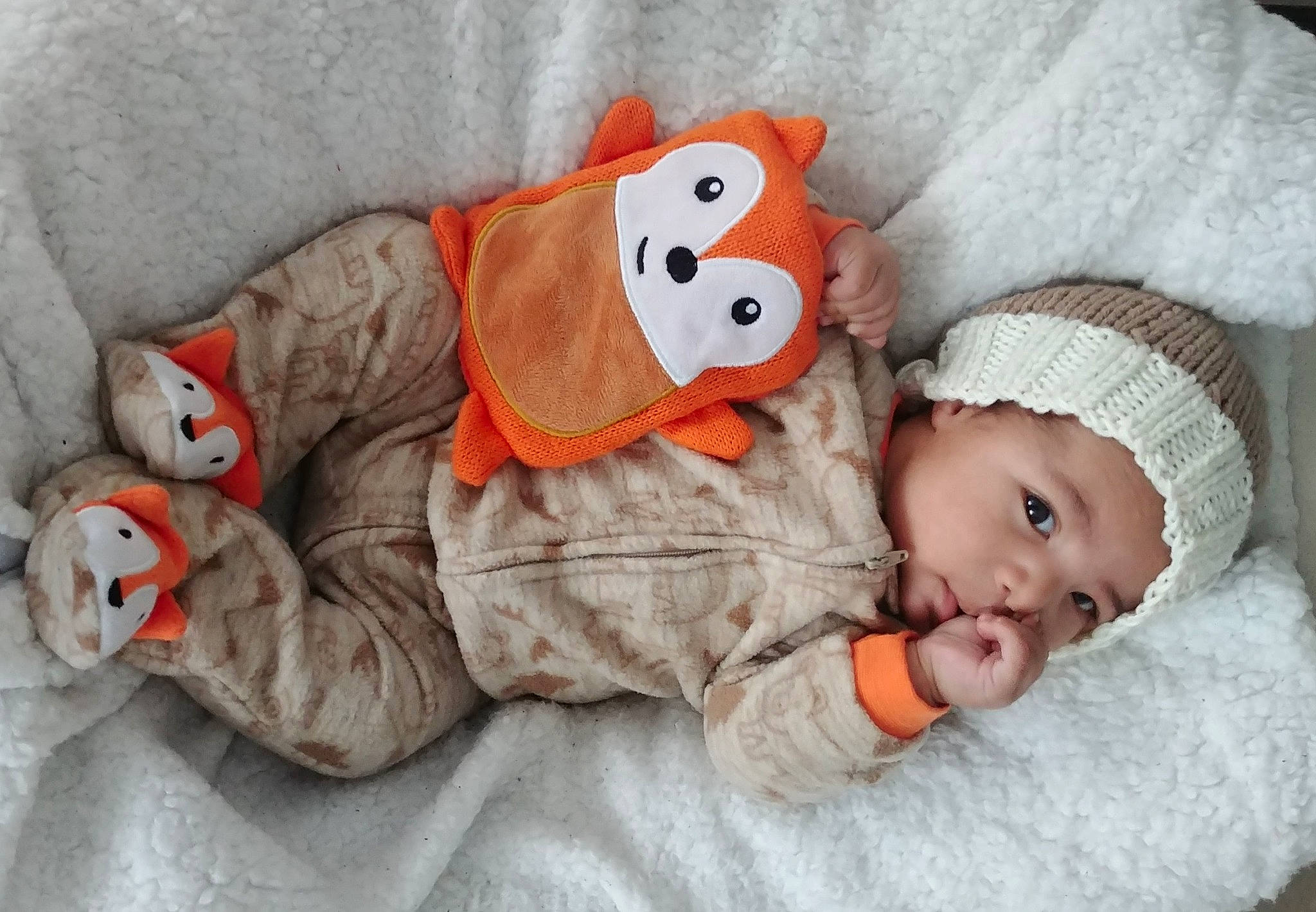 Kylan participe au concours pour gagner de l'argent avec cette photo : baby, baby_products, baby_sleeping, baby_toddler_clothing, cheek, child, comfort, eye, head, headgear, headwear, linens, mammal, person, product, skin, stuffed_toy, textile, toddler, toy