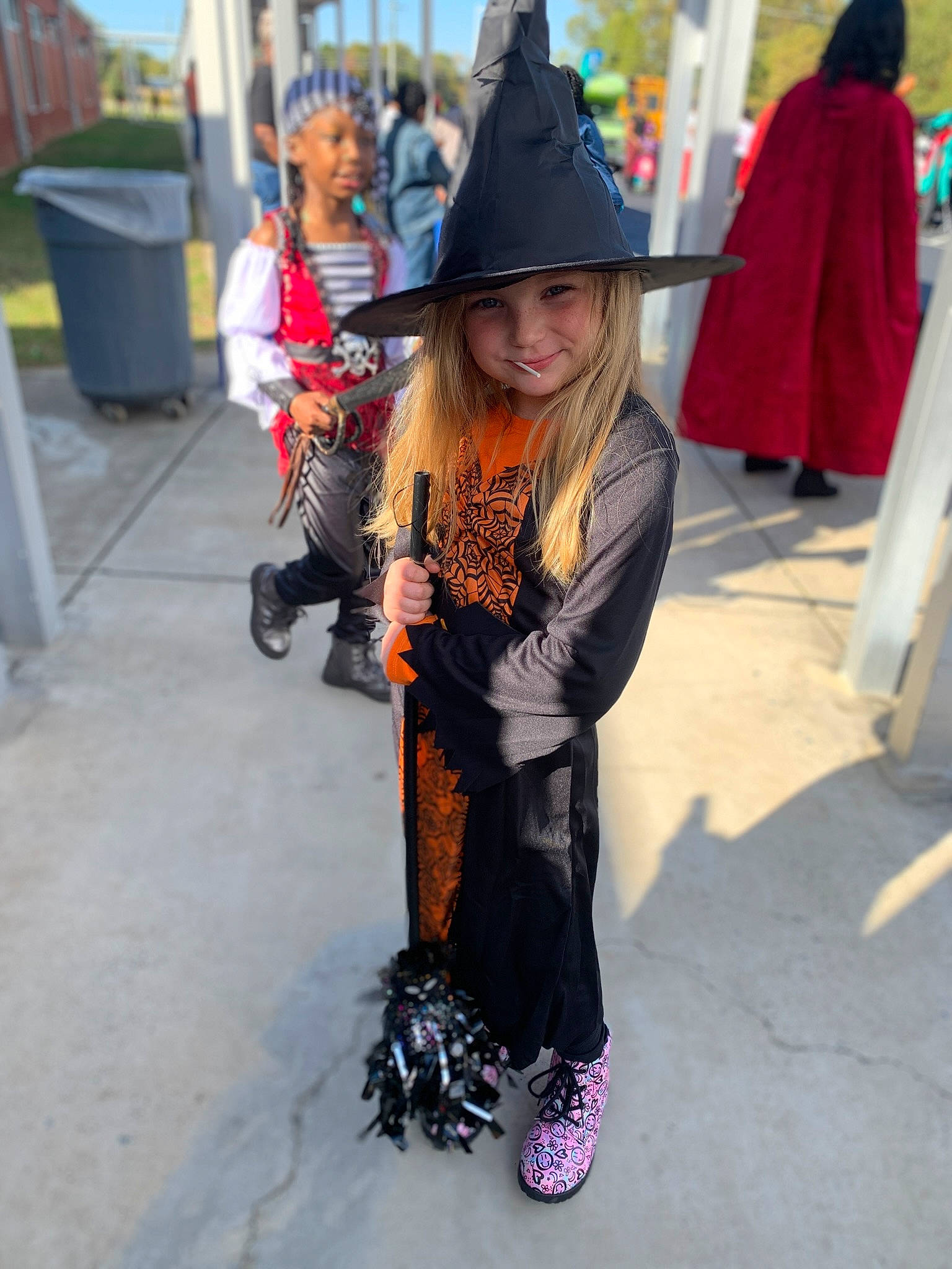 Allison joined the competition — help win amazing prizes! child, event, fashion_accessory, fedora, fun, hat, headwear, joy, leisure, luggage_and_bags, orange, outerwear, pattern, person, pink, purple, recreation, shoe, smile, street