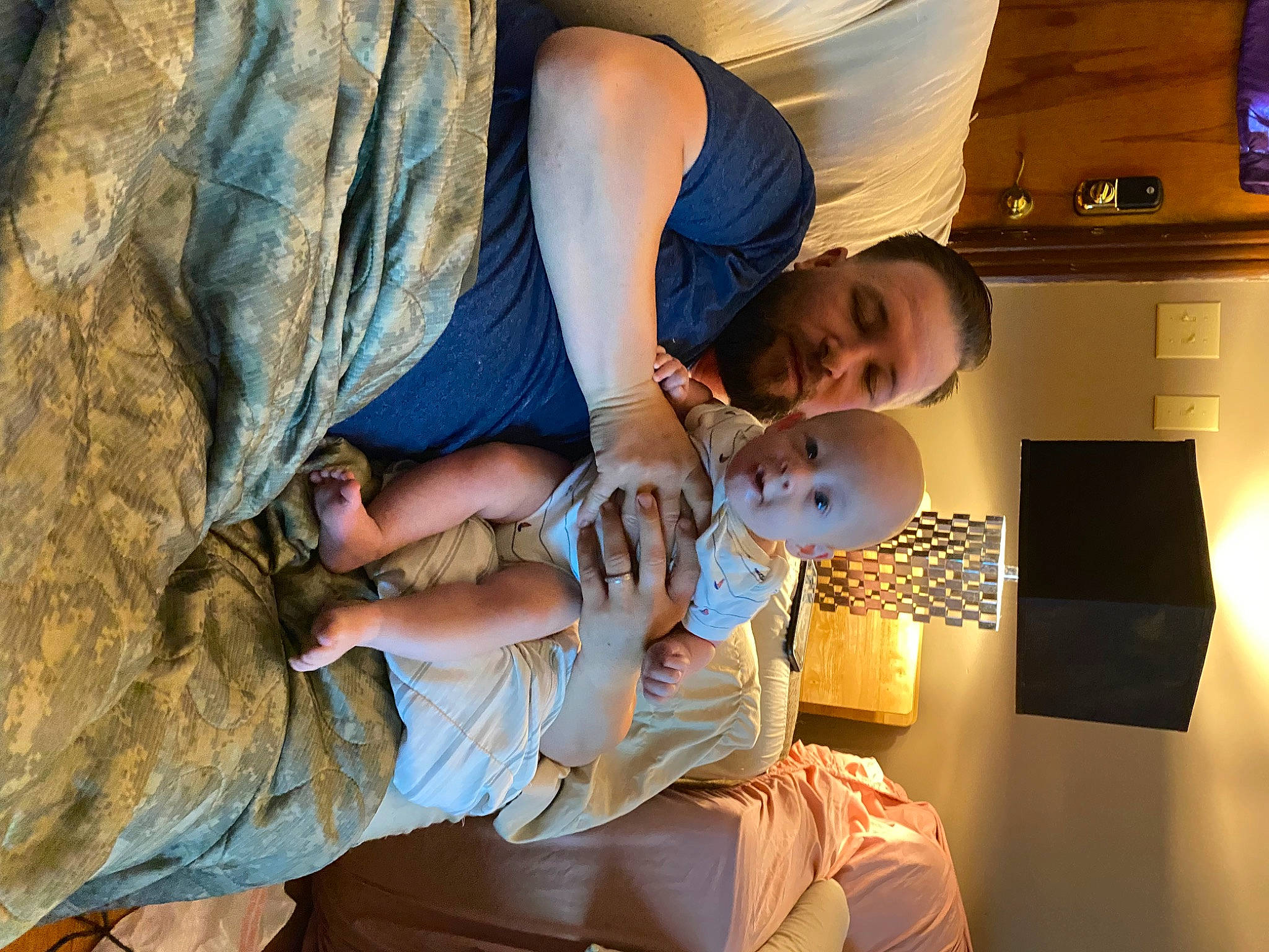 Brixton is registered to the contest to win money with this photo: arm, child, denim, elbow, event, finger, fun, gesture, happy, human_leg, leisure, person, room, shorts, sitting, t_shirt, television, thigh, toddler, tree